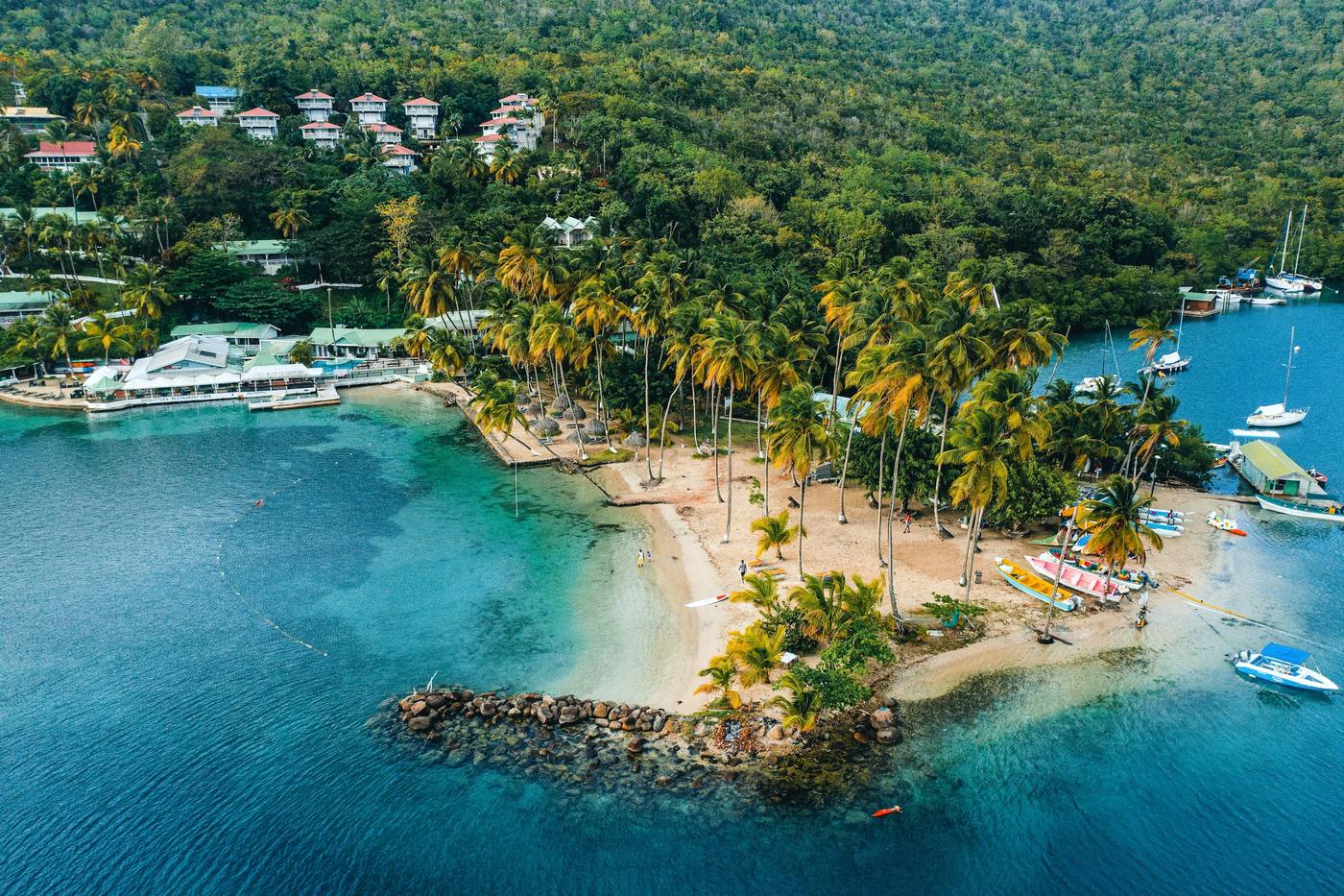Palm-fringed beach and turquoise water at Marigot Bay, St Lucia